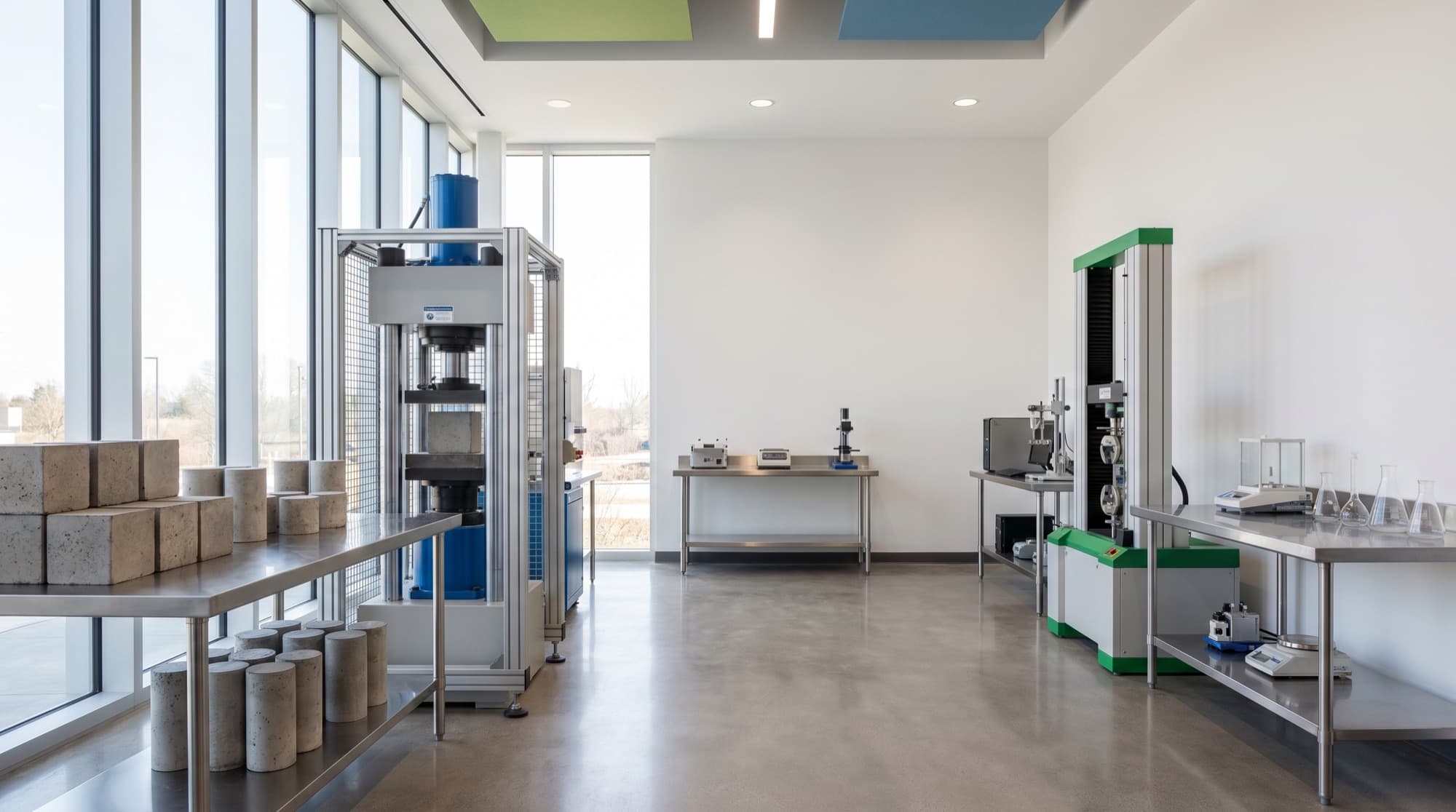 Duroscope materials testing laboratory with a concrete compression machine, universal testing machine and concrete samples