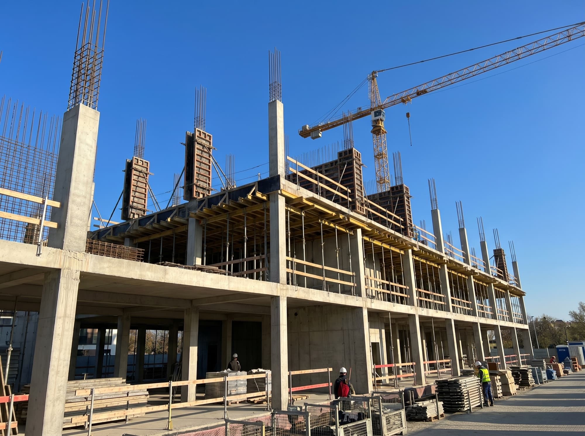 New reinforced concrete building frame under construction with rebar and formwork